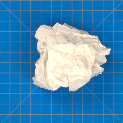 Paper Airplane Crumpled Into A Ball