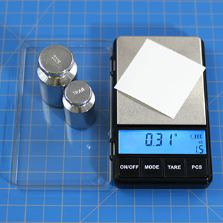 Weighing a small square of paper